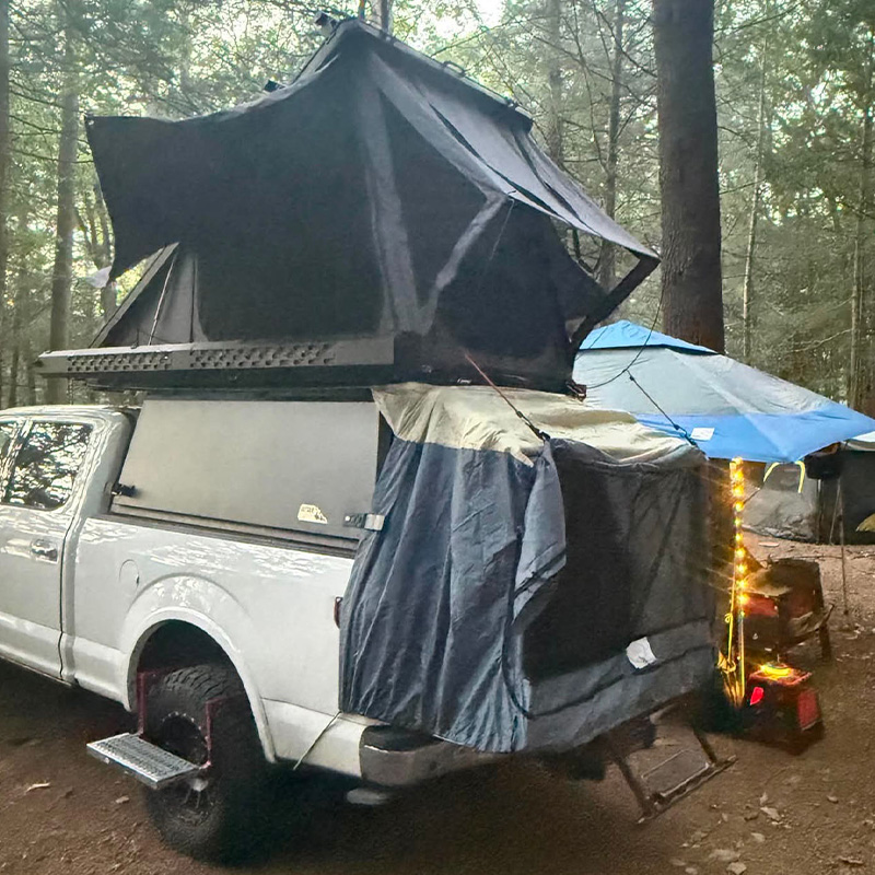 Custom truck bed camper on alternate truck